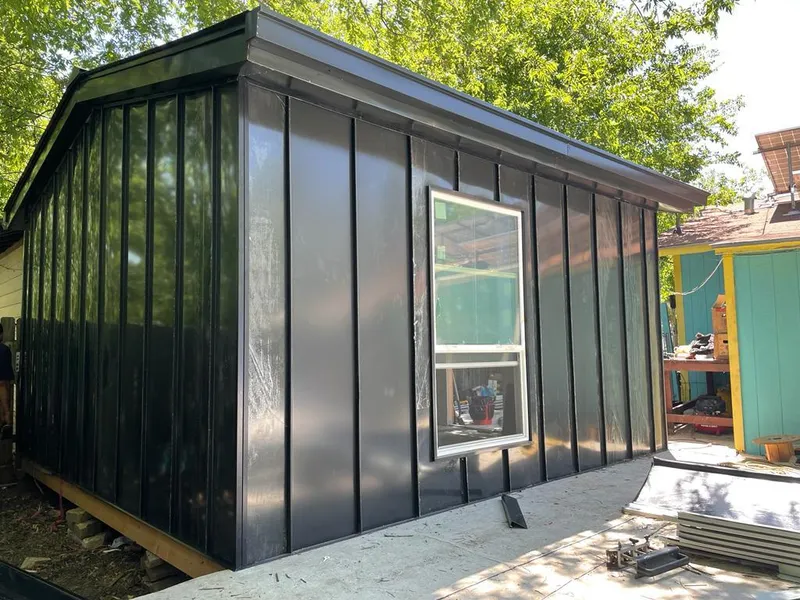 Black standing seam metal wall panels for Metal Roof Installation in Vermilion