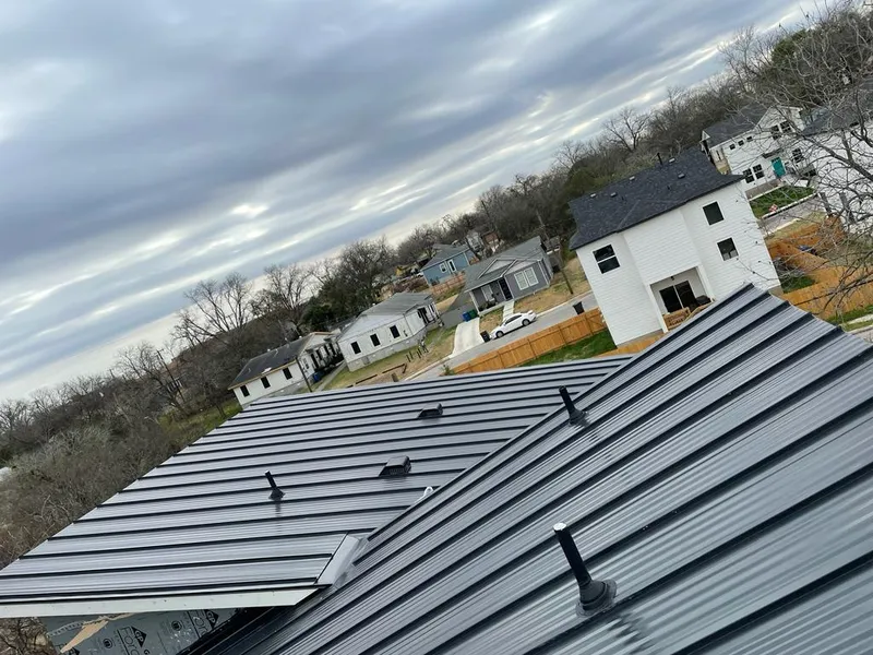 Standing seam metal roof panels with vents for Skylight Repair in Vermilion